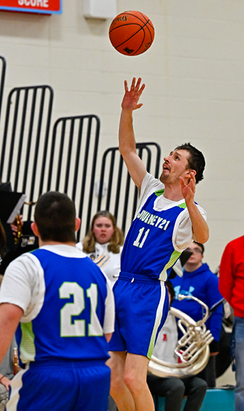 Player jumping for a basketball