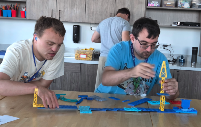 News 2 Two male students at Journey21 building with LEGO
